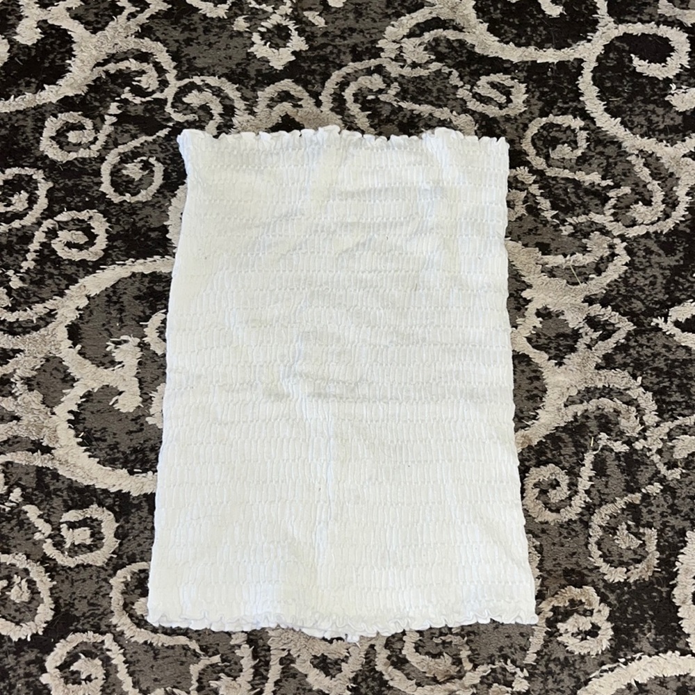 Size S, long white tube top, slightly used, in good condition.